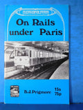 On Rails Under Paris by B.J. Prigmore  Soft Cover