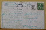 Postcard Traveling through the orange groves California 1920