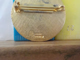 Jaycees South Dakota Mount Rushmore Round Gold in color