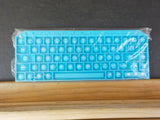 Keyboard pop it fidget toy with letters and numbers.  Big sensory pop push Blue
