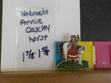 Jaycees Nebraska Anie Oakley standing in front of white horse  PIN