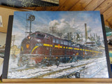 Puzzles on cardboard PRR #4267 and Alaska Railroad #4012