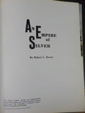 An Empire Of Silver By Robert Brown SIGNED #213 Hard Cover with plastic covering