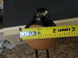 Mouth Blown glass bird Brown and black Oriole?