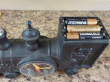 Train locomotive engine alarm clock NEEDS batteries.  MISSING battery cover