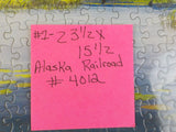 Puzzles on cardboard PRR #4267 and Alaska Railroad #4012