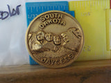 Jaycees South Dakota Mount Rushmore Round Gold in color