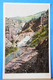 Postcard Eagle River Canyon #6751 showing railroad track, people (crease)