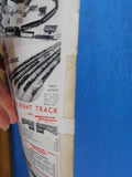 Model Trains 1955 April Smoking chimney Wreck train Grain Elevator Flat car