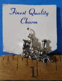 Jewelry Train engine locomotive charm Silver in color Railroad
