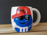 M&M Blue Player Coffee tea Mug with red hat and sunglasses