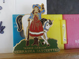 Jaycees Nebraska Anie Oakley standing in front of white horse  PIN