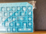 Keyboard pop it fidget toy with letters and numbers.  Big sensory pop push Blue