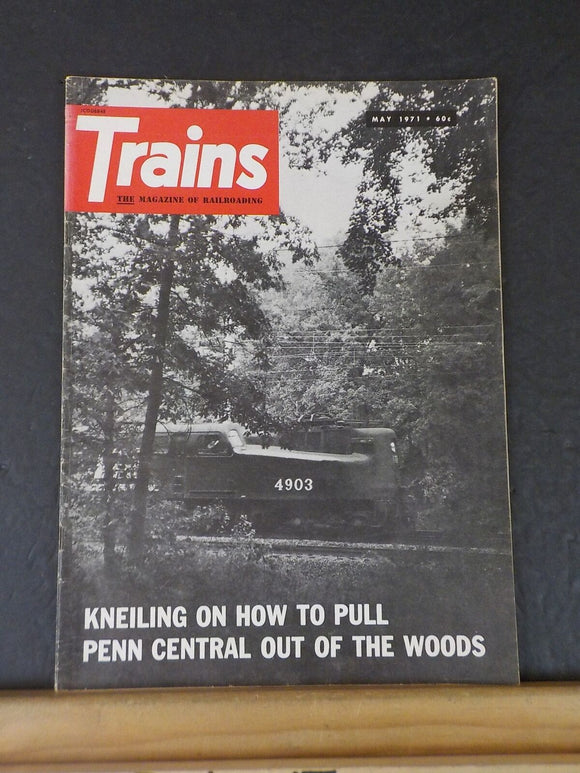 Trains Magazine 1971 May Kneiling on how to pull Penn Central out of the woods