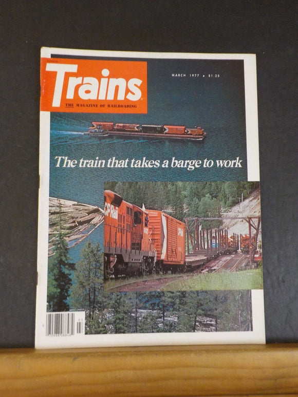 Trains Magazine 1977 March The train that takes a barge to work