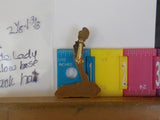 Jaycees California Nude Lady on yellow Base Yellow Hat & Dark Hair Female PIN