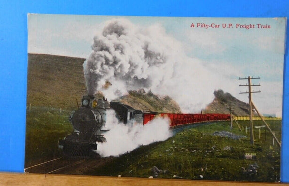 Postcard Fifty car UP freight train postmarked 1910.